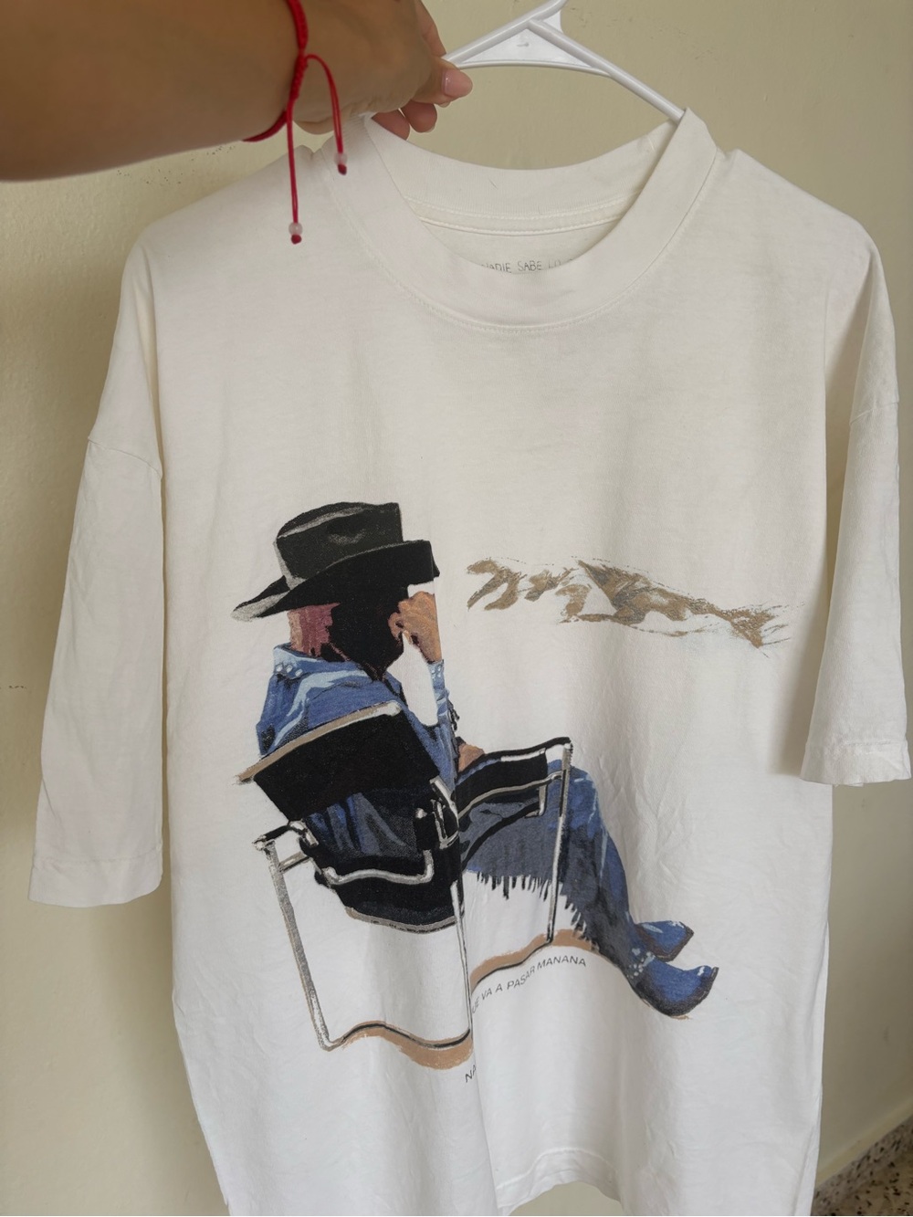 Bad bunny merch T-Shirt with Seated Cowboy nadie sabe lo que va a pasar mañana